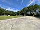 Large parking area for RV's and boats in the community, surrounded by mature trees and green space at 6636 Breezewood Blvd., Myrtle Beach, SC 29588