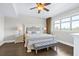 Main bedroom with hardwood floors, a ceiling fan, and neutral decor at 8121 Amalfi Pl. # 4306, Myrtle Beach, SC 29572