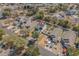 Aerial view of a residential property showcasing the house, surrounding neighborhood, and landscaping at 813 Silvercrest Dr., Myrtle Beach, SC 29579