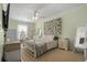 Inviting bedroom showcasing neutral tones, stylish decor, and a peaceful ambiance at 813 Silvercrest Dr., Myrtle Beach, SC 29579