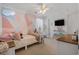 Bright bedroom featuring a unique geometric accent wall, plush bedding, and ample natural light at 813 Silvercrest Dr., Myrtle Beach, SC 29579
