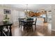 Charming dining area with a dark wood table and chairs next to the kitchen at 813 Silvercrest Dr., Myrtle Beach, SC 29579