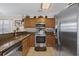 Modern kitchen with stainless steel appliances, granite countertops, and ample cabinet space at 813 Silvercrest Dr., Myrtle Beach, SC 29579