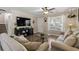 Cozy living room featuring a large window, plush sofas, and modern decor at 813 Silvercrest Dr., Myrtle Beach, SC 29579