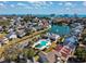 Community aerial showcasing ocean views and a community pool surrounded by well-manicured landscaping at 919 Salt Pl., Murrells Inlet, SC 29576