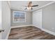 Spacious bedroom features a ceiling fan, a window, and closet with bi-fold doors at 919 Salt Pl., Murrells Inlet, SC 29576