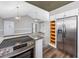 Bright, open kitchen with stainless steel appliances and open access to the living area provides plenty of space at 919 Salt Pl., Murrells Inlet, SC 29576