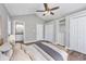 Spacious main bedroom features vaulted ceiling, ensuite access, and built-in storage for a comfortable space at 919 Salt Pl., Murrells Inlet, SC 29576