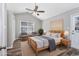 Bright bedroom with vaulted ceiling, ample natural light and neutral tones create a comfortable and inviting space at 919 Salt Pl., Murrells Inlet, SC 29576