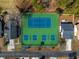Aerial shot of the community tennis and pickleball courts surrounded by mature trees at 919 Salt Pl., Murrells Inlet, SC 29576