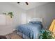 Cozy bedroom featuring a white headboard bed, warm lighting, and wood-look floors at 933 Jackline Place # 101, Murrells Inlet, SC 29576
