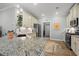 Bright kitchen featuring granite countertops, stainless steel appliances, and pendant lighting at 933 Jackline Place # 101, Murrells Inlet, SC 29576