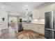 Bright kitchen featuring stainless steel appliances, granite counters, and modern cabinetry at 933 Jackline Place # 101, Murrells Inlet, SC 29576