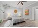 Comfortable bedroom featuring neutral colors, bedside tables with lamps, and hardwood floors at 933 Jackline Place # 101, Murrells Inlet, SC 29576