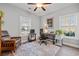 Bright home office with two windows, neutral walls, and comfortable workspace at 933 Jackline Place # 101, Murrells Inlet, SC 29576