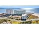 Beautiful coastal condo community with ocean views, pools, tennis courts, parking, and nearby waterway at 9400 Shore Dr. # 722, Myrtle Beach, SC 29572