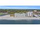 Breathtaking aerial view of the beachfront resort, beach, and surrounding lush landscape at 9400 Shore Dr. # 722, Myrtle Beach, SC 29572