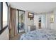 Relaxing bedroom with balcony access and an adjacent full bathroom at 9400 Shore Dr. # 722, Myrtle Beach, SC 29572