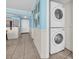 Convenient laundry area with stacked washer and dryer at 9400 Shore Dr. # 722, Myrtle Beach, SC 29572