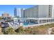 Inviting outdoor pool area with ample lounge chairs at 9400 Shore Dr. # 722, Myrtle Beach, SC 29572
