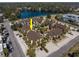Enjoy poolside relaxation in this lush condo community surrounded by mature palm trees at 10200 Lake Shore Dr. # 16, Myrtle Beach, SC 29572