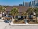 Aerial view of townhomes with palm trees, showcasing proximity to beach and city at 10200 Lake Shore Dr. # 16, Myrtle Beach, SC 29572