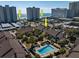 Luxury beachfront condos overlooking a sparkling pool and private tennis courts at 10200 Lake Shore Dr. # 16, Myrtle Beach, SC 29572