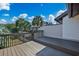 Wood balcony with view of palm trees and other buildings at 10200 Lake Shore Dr. # 16, Myrtle Beach, SC 29572