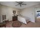 Serene bedroom featuring a bed, dresser, chair, overhead fan, and carpeted floor at 10200 Lake Shore Dr. # 16, Myrtle Beach, SC 29572