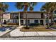 Charming two-story townhome featuring a private balcony and brick accents at 10200 Lake Shore Dr. # 16, Myrtle Beach, SC 29572