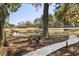 Backyard view with a path and trees at 1046 Wallace Pate Dr., Georgetown, SC 29440