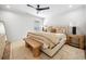 Stylish bedroom features neutral colors, unique decor, and an accent bench at 1046 Wallace Pate Dr., Georgetown, SC 29440