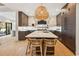 Elegant kitchen with a large center island, custom cabinets, and modern lighting at 1046 Wallace Pate Dr., Georgetown, SC 29440
