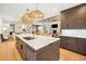 Gourmet kitchen features a large island with a marble countertop and modern appliances at 1046 Wallace Pate Dr., Georgetown, SC 29440