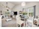 Bright and open dining area with natural light, a ceiling fan, and neutral decor throughout at 1129 Peace Pipe Pl. # 204, Myrtle Beach, SC 29579