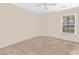 Well-lit bedroom with a window offering scenic views, creating a bright living space at 1282 River Oaks Dr. # 9F, Myrtle Beach, SC 29579