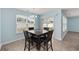 Bright dining area featuring a wood table set, natural light and view to backyard at 1320 Midtown Village Dr., Conway, SC 29526