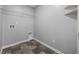 A walk-in closet with shelving and vinyl flooring, and a laundry hookup at 1320 Midtown Village Dr., Conway, SC 29526