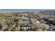 This is an aerial view of a marsh front complex of homes nestled among trees at 136 Da Gullah Way # A, Pawleys Island, SC 29585
