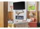 Close up of modern electric fireplace surrounded by wood trim in a well decorated living room at 136 Da Gullah Way # A, Pawleys Island, SC 29585