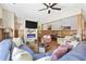 Open living room with hardwood floors, fireplace, and ample seating creates a cozy atmosphere at 136 Da Gullah Way # A, Pawleys Island, SC 29585