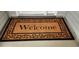 Welcoming doormat with decorative border at 1407 Gooseneck Place # 202, Murrells Inlet, SC 29576