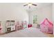 Bright bedroom featuring toys, playhouse, and a window at 1487 Lanterns Rest Rd. # 4, Myrtle Beach, SC 29579
