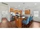 Spacious kitchen boasts stainless steel appliances, granite countertops, and a breakfast bar with seating at 1487 Lanterns Rest Rd. # 4, Myrtle Beach, SC 29579