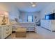 Spacious bedroom with large bed, carpeted floors and window views at 177 Fox Rae Dr., Conway, SC 29526