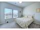 This is a bedroom with large windows that bring in natural light, a comfortable bed, and neutral walls at 177 Fox Rae Dr., Conway, SC 29526