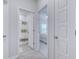 Hallway with doors leading to the bathroom and the primary bedroom at 177 Fox Rae Dr., Conway, SC 29526