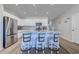 Bright kitchen island with seating, granite countertops, and stainless steel appliances at 177 Fox Rae Dr., Conway, SC 29526
