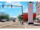 Scenic street view with local traffic, a prominent clock tower, and historic buildings under a sunny sky at 177 Fox Rae Dr., Conway, SC 29526