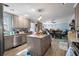 Open-concept kitchen featuring a central island and dining area at 1917 Candy Ln., Surfside Beach, SC 29575